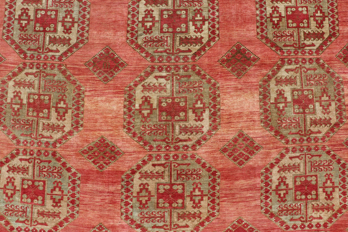 Antique Turkomen Ersari Rug with Repeating Gul Design. Antique Turkomen Ersari Rug with Repeating Gul Design in soft red background, green, light blue, butter yellow. Hand - Knotted Ersari Rug. Keivan Woven Arts; rug EMB - 9656 - P13592, country of origin / ... - Keivan Woven ArtsEMB - 9656 - P13592 - 16139Rug