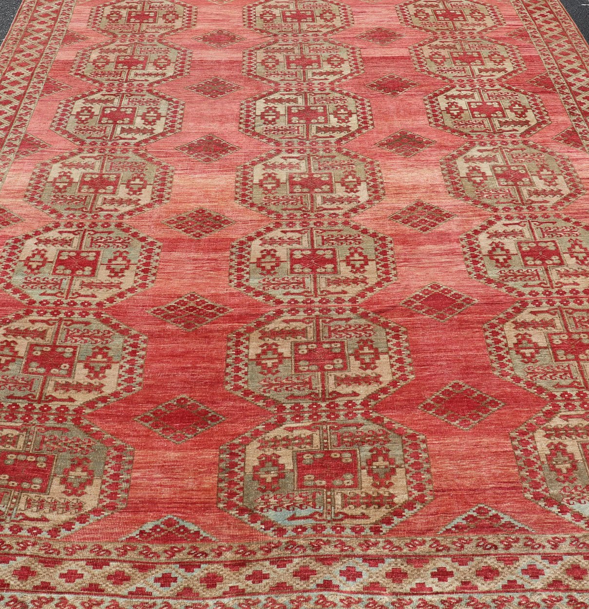 Antique Turkomen Ersari Rug with Repeating Gul Design. Antique Turkomen Ersari Rug with Repeating Gul Design in soft red background, green, light blue, butter yellow. Hand - Knotted Ersari Rug. Keivan Woven Arts; rug EMB - 9656 - P13592, country of origin / ... - Keivan Woven ArtsEMB - 9656 - P13592 - 16139Rug