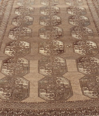 Hand - Knotted Turkomen Ersari Rug in Wool with Sub - Geometric Repeating Gul Design This Ersari rug has been hand - knotted in the finest wool. The rug features a sub - geometric repeating Gul design throughout the entirety of the rug, enclosed within... - Keivan Woven ArtsEMB - 9658 - P13539 - 16151Rug