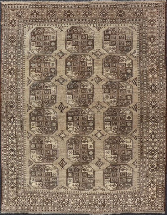 Hand - Knotted Turkomen Ersari Rug in Wool with All - Over Repeating Gul Design This Ersari rug has been hand - knotted in the finest wool. The rug features an all - over repeating Gul design throughout the entirety of the rug, enclosed within a comple... - Keivan Woven ArtsEMB - 9659 - P13591 - 16157Rug