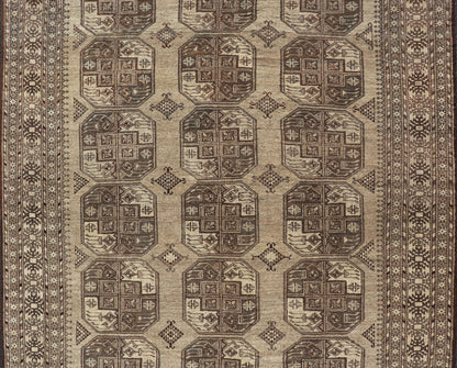 Hand - Knotted Turkomen Ersari Rug in Wool with All - Over Repeating Gul Design This Ersari rug has been hand - knotted in the finest wool. The rug features an all - over repeating Gul design throughout the entirety of the rug, enclosed within a comple... - Keivan Woven ArtsEMB - 9659 - P13591 - 16157Rug