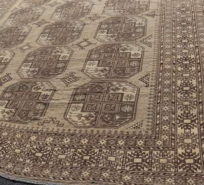 Hand - Knotted Turkomen Ersari Rug in Wool with All - Over Repeating Gul Design This Ersari rug has been hand - knotted in the finest wool. The rug features an all - over repeating Gul design throughout the entirety of the rug, enclosed within a comple... - Keivan Woven ArtsEMB - 9659 - P13591 - 16157Rug