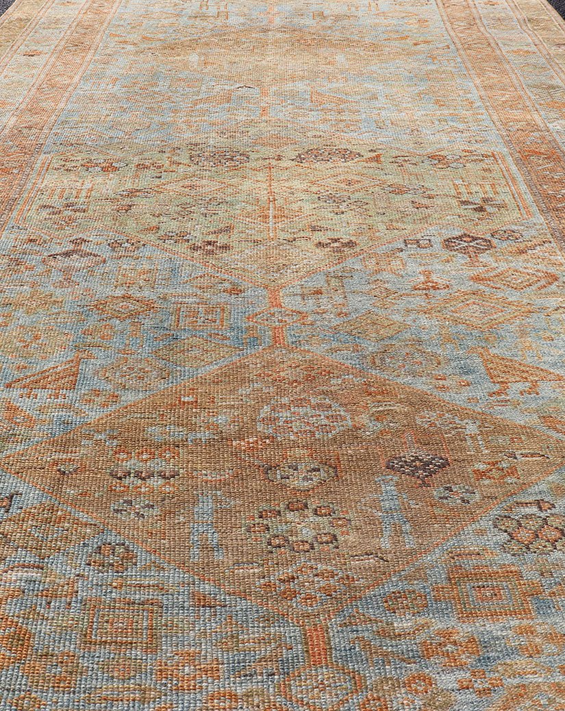 Antique distressed Persian Kurdish with medallion design in muted colors rug EMB - 9661 - P13590, Keivan Woven Arts / country of origin / type: Iran / Kurdish, circa 1900. Measures: 5 x 9'9 Antique Hand Knotted Persian Kurdish Rug in Blu... - Keivan Woven ArtsEMB - 9661 - P13590 - 16169Rug