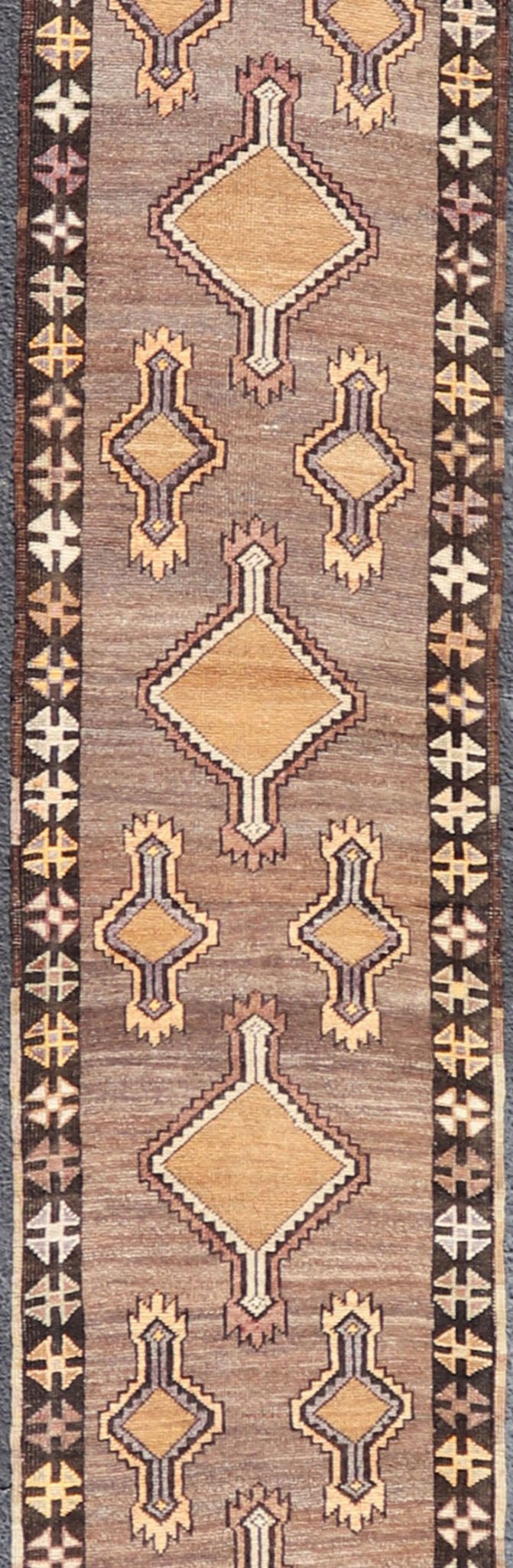 Long Vintage Turkish Kars Narrow Runner with Tribal Design. Long and Narrow Vintage Turkish Kars Runner with Tribal Design and Medallions in light purple, light orange, gray . Keivan Woven Arts / rug/ EMB - 9662 - P13548, country of origin / type: T... - Keivan Woven ArtsEMB - 9662 - P13548 - 16175Rug