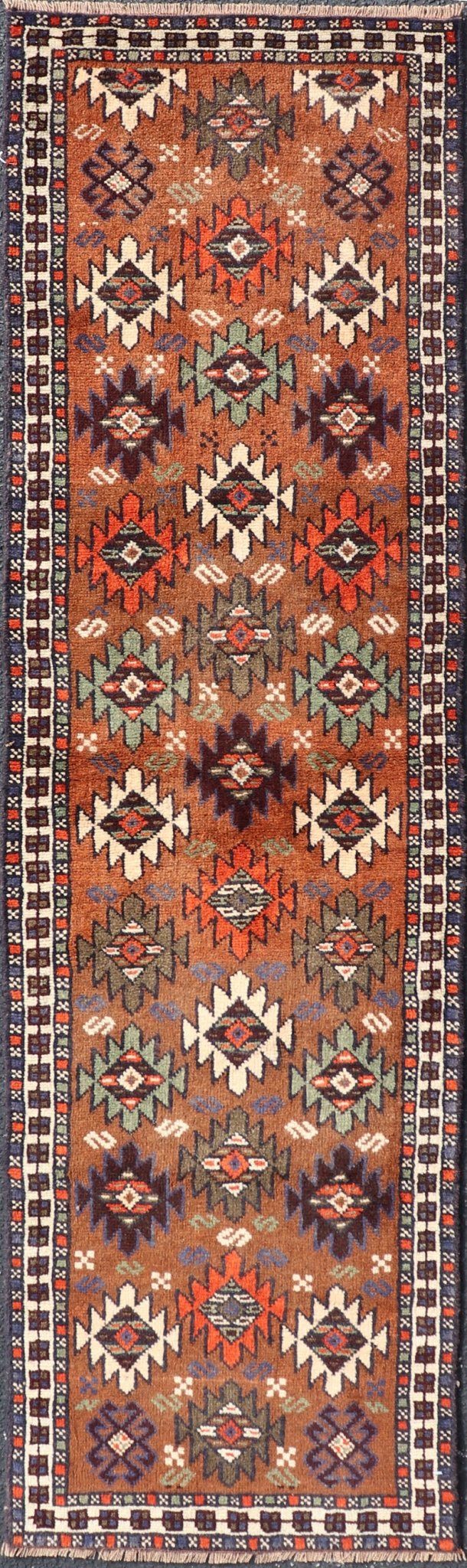 Vintage Turkish Kars Runner with Tribal Motif Design in Orange - Brown Colors. Keivan Woven Arts / rug EMB - 9663 - P13552, country of origin / type: Turkey / Oushak, circa mid - 20th century. This vintage runner features an assortment of tribal and geo... - Keivan Woven ArtsEMB - 9663 - P13552 - 16181Rug