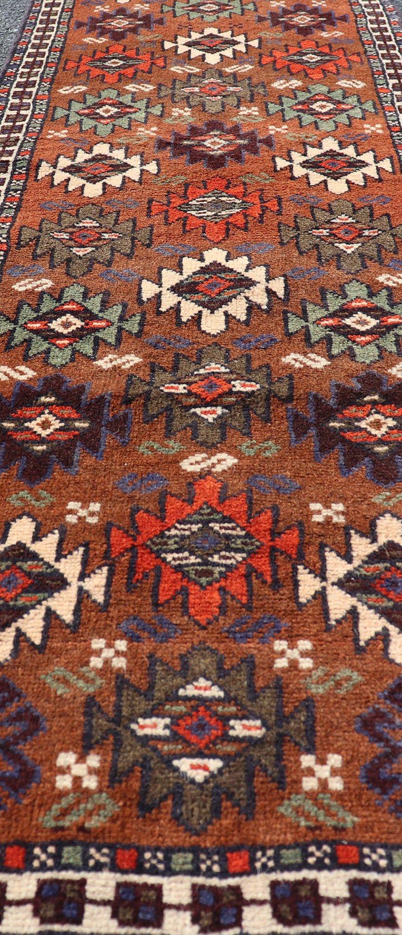 Vintage Turkish Kars Runner with Tribal Motif Design in Orange - Brown Colors. Keivan Woven Arts / rug EMB - 9663 - P13552, country of origin / type: Turkey / Oushak, circa mid - 20th century. This vintage runner features an assortment of tribal and geo... - Keivan Woven ArtsEMB - 9663 - P13552 - 16181Rug