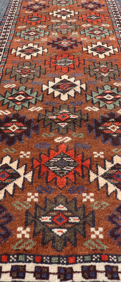 Vintage Turkish Kars Runner with Tribal Motif Design in Orange - Brown Colors. Keivan Woven Arts / rug EMB - 9663 - P13552, country of origin / type: Turkey / Oushak, circa mid - 20th century. This vintage runner features an assortment of tribal and geo... - Keivan Woven ArtsEMB - 9663 - P13552 - 16181Rug