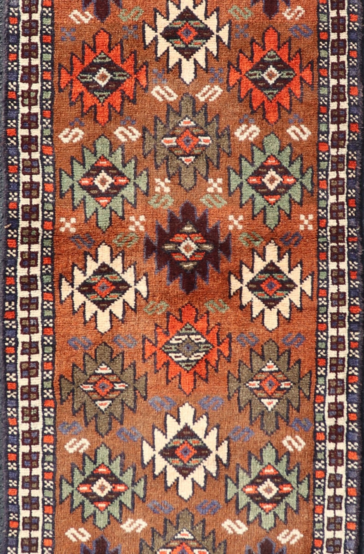 Vintage Turkish Kars Runner with Tribal Motif Design in Orange - Brown Colors. Keivan Woven Arts / rug EMB - 9663 - P13552, country of origin / type: Turkey / Oushak, circa mid - 20th century. This vintage runner features an assortment of tribal and geo... - Keivan Woven ArtsEMB - 9663 - P13552 - 16181Rug