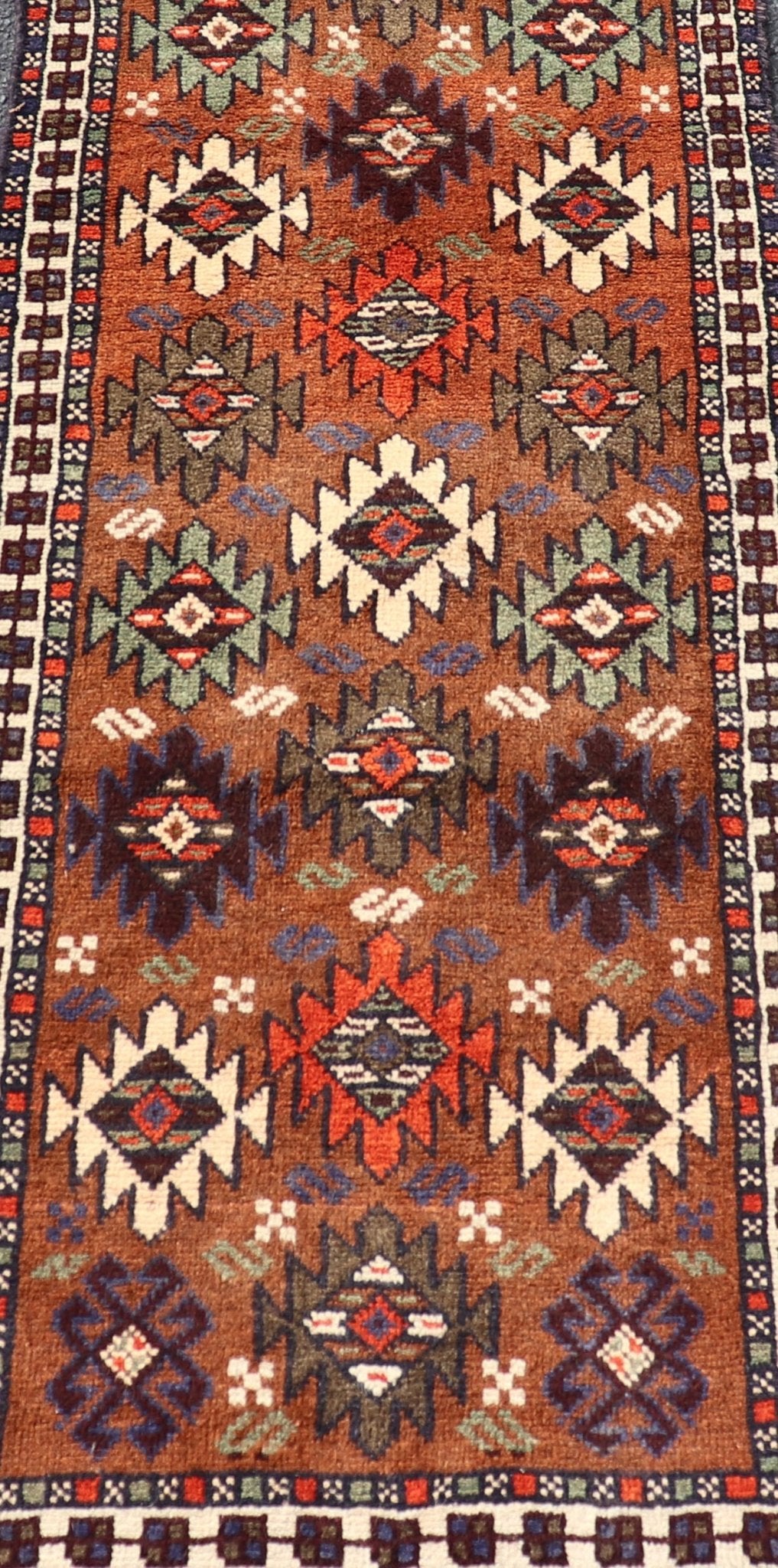Vintage Turkish Kars Runner with Tribal Motif Design in Orange - Brown Colors. Keivan Woven Arts / rug EMB - 9663 - P13552, country of origin / type: Turkey / Oushak, circa mid - 20th century. This vintage runner features an assortment of tribal and geo... - Keivan Woven ArtsEMB - 9663 - P13552 - 16181Rug