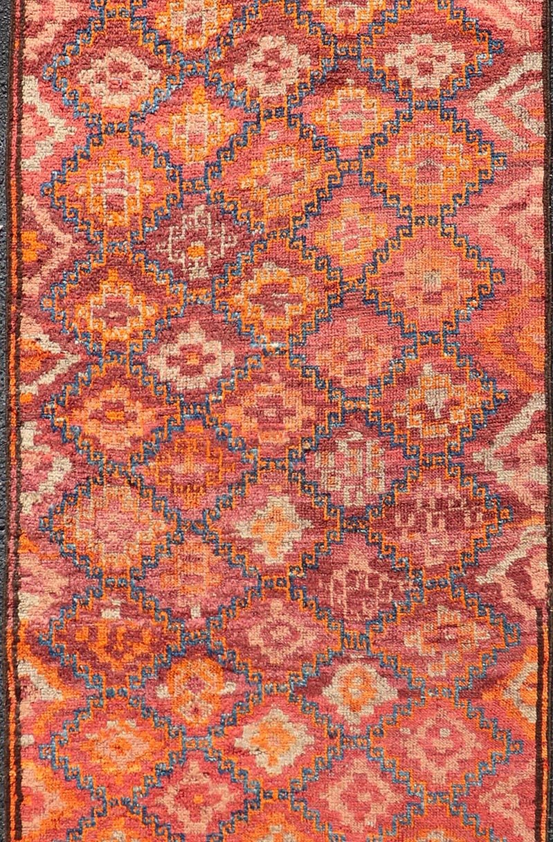 Antique Hand - Knotted Baluch Runner with All - Over Sub - Geometric Diamond Design, Baluchi runner This Antique Baluch Runner has been hand - knotted and features an impressive all - over sub - geometric diamond design replete in multicolor. The rug is enc... - Keivan Woven ArtsEMB - 9666A - P13556 - 16187Rug