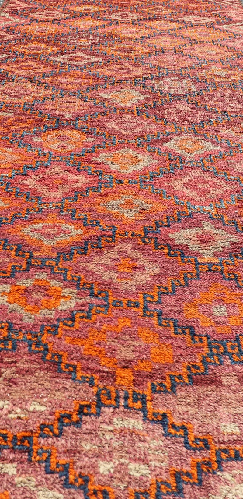 Antique Hand - Knotted Baluch Runner with All - Over Sub - Geometric Diamond Design, Baluchi runner This Antique Baluch Runner has been hand - knotted and features an impressive all - over sub - geometric diamond design replete in multicolor. The rug is enc... - Keivan Woven ArtsEMB - 9666A - P13556 - 16187Rug