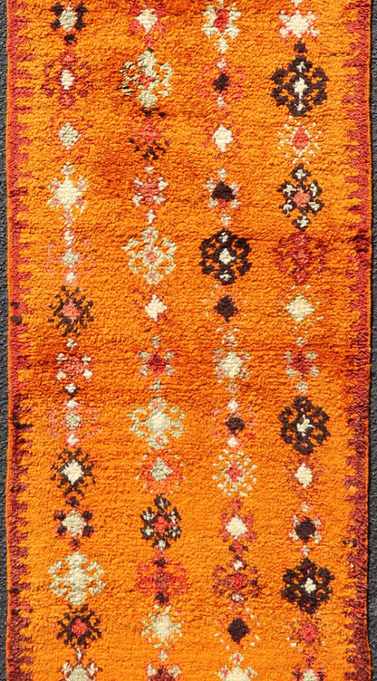 Vintage Moroccan Runner with Sub - Geometric Motifs in Saffron, Gold and Orange This lovely Vintage Moroccan Carpet (circa 1940s), features an all - over sub - geometric design rendered in Saffron, Ivory, Brown and variations of Red, Green, Gold & Ora... - Keivan Woven ArtsEMB - 9667 - P13564 - 16193Rug