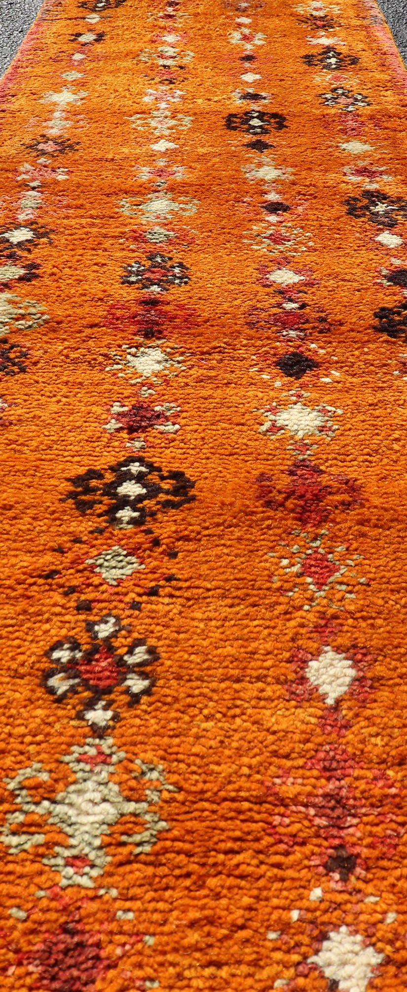 Vintage Moroccan Runner with Sub - Geometric Motifs in Saffron, Gold and Orange This lovely Vintage Moroccan Carpet (circa 1940s), features an all - over sub - geometric design rendered in Saffron, Ivory, Brown and variations of Red, Green, Gold & Ora... - Keivan Woven ArtsEMB - 9667 - P13564 - 16193Rug