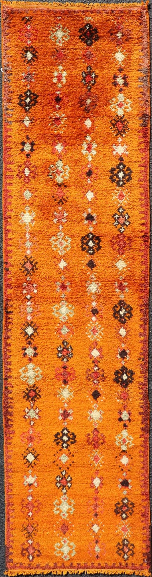 Vintage Moroccan Runner with Sub - Geometric Motifs in Saffron, Gold and Orange This lovely Vintage Moroccan Carpet (circa 1940s), features an all - over sub - geometric design rendered in Saffron, Ivory, Brown and variations of Red, Green, Gold & Ora... - Keivan Woven ArtsEMB - 9667 - P13564 - 16193Rug