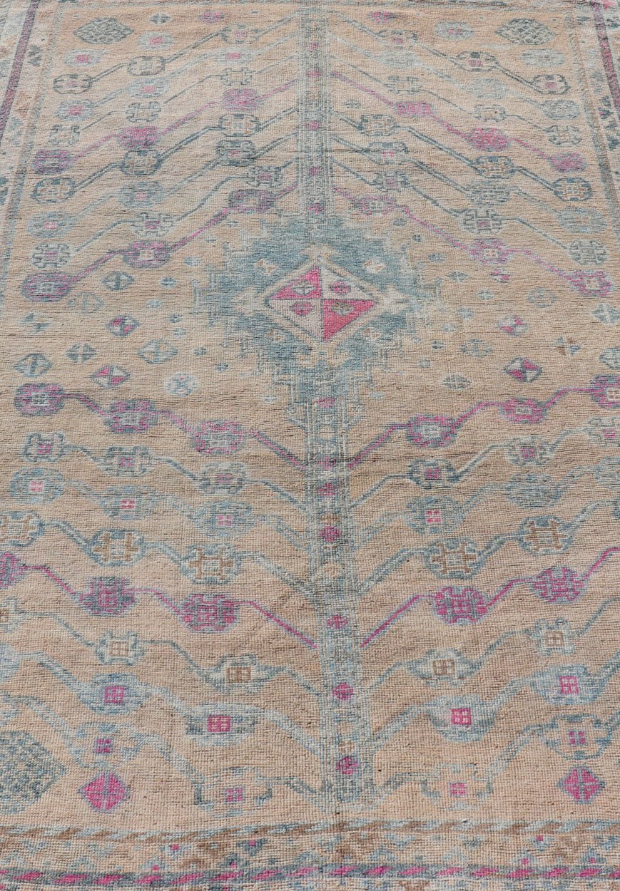 Measures: 4'10 x 7'4 Vintage Persian Shiraz with Tribal Design in Soft Yellow, Pink, and Blue Gray. Keivan Woven Arts / rug EMB - 9668 - 13562, country of origin / type: Persian / Tribal, circa mid - 20th century. This vintage Persian rug feature... - Keivan Woven ArtsEMB - 9668 - P13562 - 16199Rug