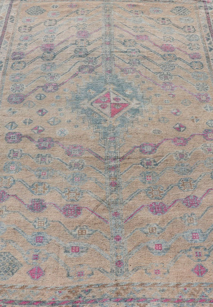Measures: 4'10 x 7'4 Vintage Persian Shiraz with Tribal Design in Soft Yellow, Pink, and Blue Gray. Keivan Woven Arts / rug EMB - 9668 - 13562, country of origin / type: Persian / Tribal, circa mid - 20th century. This vintage Persian rug feature... - Keivan Woven ArtsEMB - 9668 - P13562 - 16199Rug