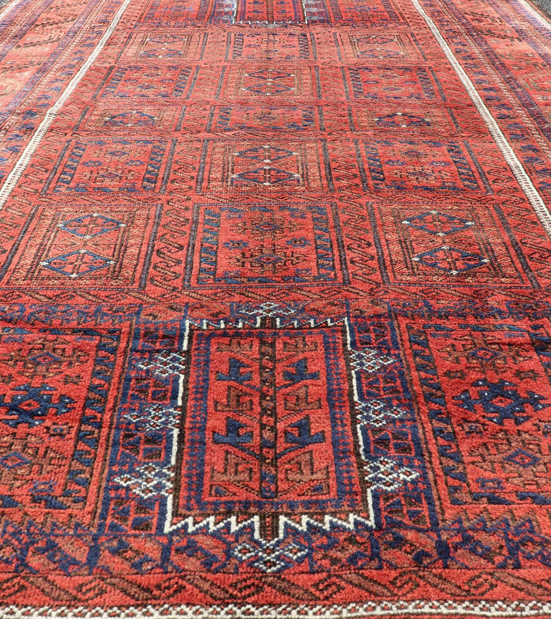 Antique Baluch Tribal Rug with All - Over Geometric Medallion Design in Red. Keivan Woven Arts, rug EMB - 9672 - P13589; country of origin / type: iran / Baluch, circa 1920s. This Antique Baluch Rug has been hand - knotted and features an impressive all... - Keivan Woven ArtsEMB - 9672 - P13589 - 16253Rug