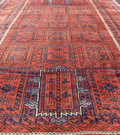 Antique Baluch Tribal Rug with All - Over Geometric Medallion Design in Red. Keivan Woven Arts, rug EMB - 9672 - P13589; country of origin / type: iran / Baluch, circa 1920s. This Antique Baluch Rug has been hand - knotted and features an impressive all... - Keivan Woven ArtsEMB - 9672 - P13589 - 16253Rug