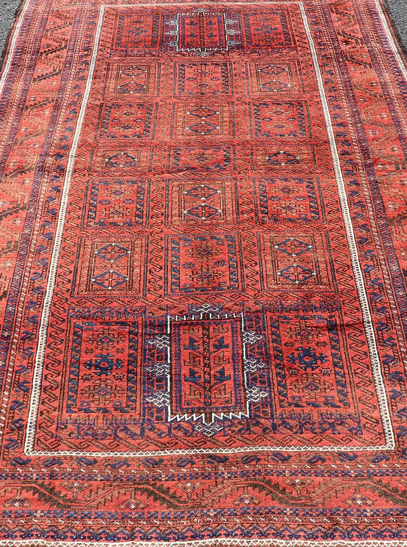 Antique Baluch Tribal Rug with All - Over Geometric Medallion Design in Red. Keivan Woven Arts, rug EMB - 9672 - P13589; country of origin / type: iran / Baluch, circa 1920s. This Antique Baluch Rug has been hand - knotted and features an impressive all... - Keivan Woven ArtsEMB - 9672 - P13589 - 16253Rug
