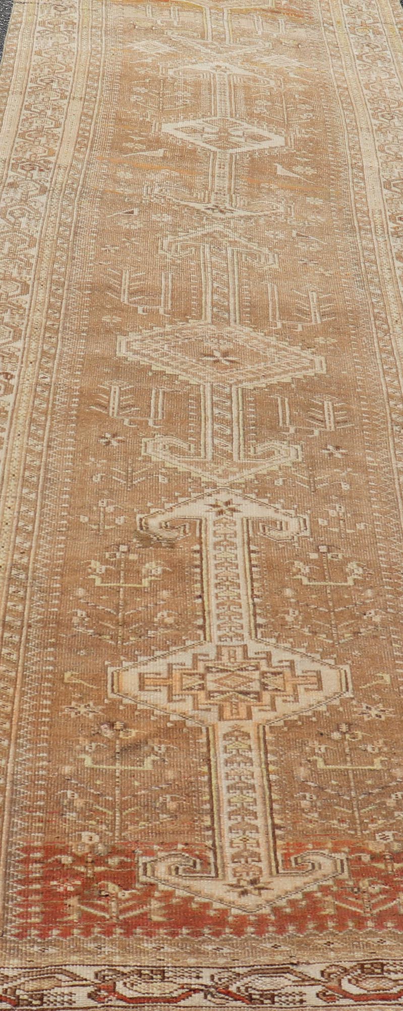 Measures: 3'9 x 14'3 Long Persian Heriz Runner with Central Medallions in Brown, Maroon, Tan & Red. Keivan Woven Arts / rug EMB - 9675 - 13537, country of origin / type: Iran / Heriz, circa 1920. This magnificent long Persian Heriz runner bears ... - Keivan Woven ArtsEMB - 9675 - 13537 - 16223Rug