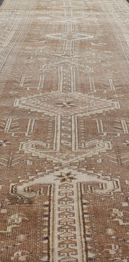 Measures: 3'9 x 14'3 Long Persian Heriz Runner with Central Medallions in Brown, Maroon, Tan & Red. Keivan Woven Arts / rug EMB - 9675 - 13537, country of origin / type: Iran / Heriz, circa 1920. This magnificent long Persian Heriz runner bears ... - Keivan Woven ArtsEMB - 9675 - 13537 - 16223Rug