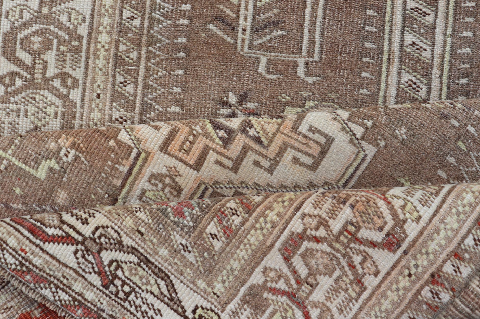 Measures: 3'9 x 14'3 Long Persian Heriz Runner with Central Medallions in Brown, Maroon, Tan & Red. Keivan Woven Arts / rug EMB - 9675 - 13537, country of origin / type: Iran / Heriz, circa 1920. This magnificent long Persian Heriz runner bears ... - Keivan Woven ArtsEMB - 9675 - 13537 - 16223Rug