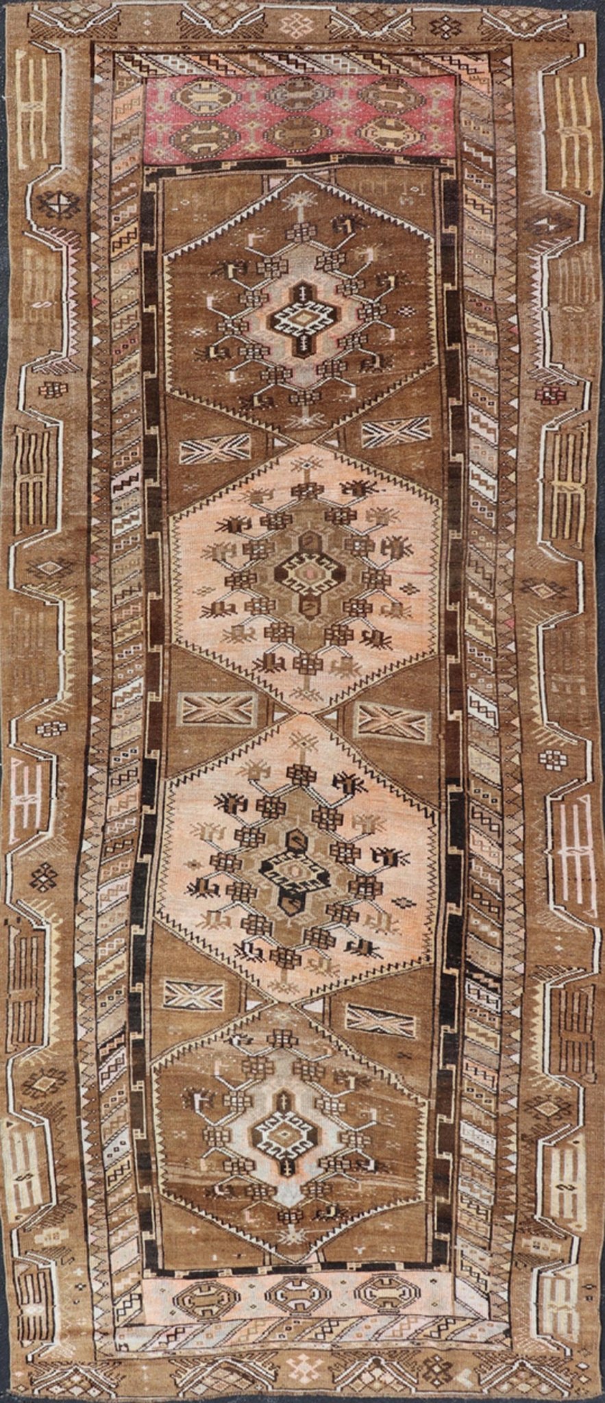 Vintage Hand - Knotted Turkish Kars Galley Rug in Wool with Medallion Design This vintage Turkish Kars gallery rug has been hand - knotted in wool and features a sub - geometric medallion design rendered in multicolor. A complementary, multi - tiered b... - Keivan Woven ArtsEMB - 9676 - P13554 - 16229Rug