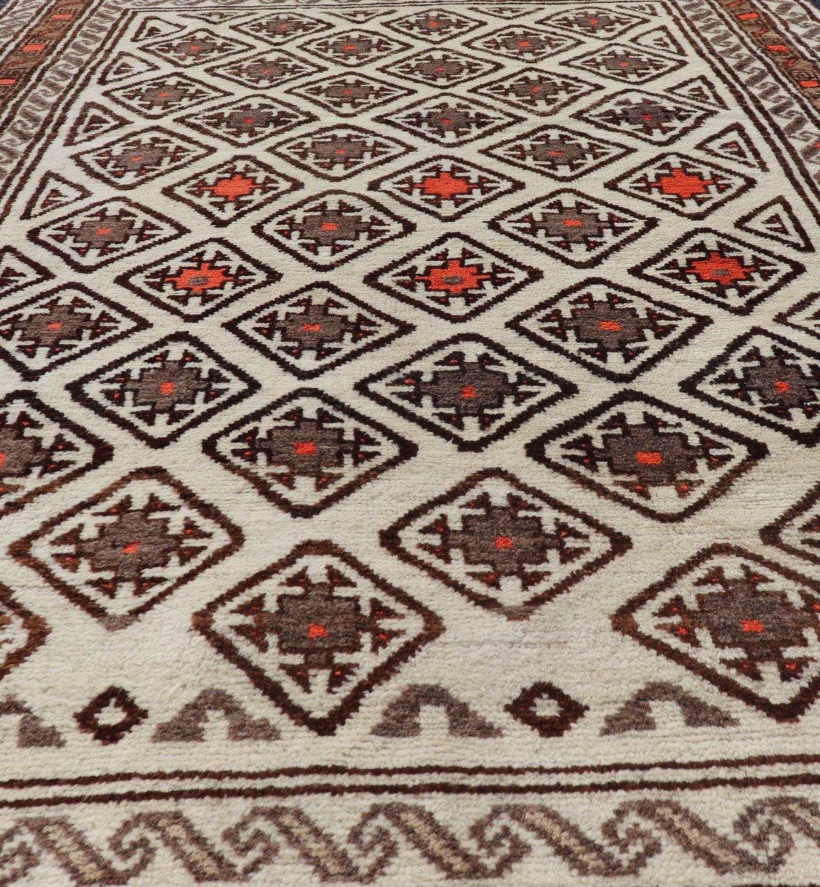 Antique Hand - Knotted Baluch Tribal Rug with All - Over Geometric Diamond Design. Keivan Woven Arts, rug EMB - 9679 - P13559; country of origin / type: Iran / Baluch, circa 1930s. This Antique Baluch Rug has been hand - knotted and features an impressive... - Keivan Woven ArtsEMB - 9679 - P13559 - 16241Rug