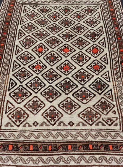 Antique Hand - Knotted Baluch Tribal Rug with All - Over Geometric Diamond Design. Keivan Woven Arts, rug EMB - 9679 - P13559; country of origin / type: Iran / Baluch, circa 1930s. This Antique Baluch Rug has been hand - knotted and features an impressive... - Keivan Woven ArtsEMB - 9679 - P13559 - 16241Rug