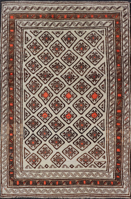 Antique Hand - Knotted Baluch Tribal Rug with All - Over Geometric Diamond Design. Keivan Woven Arts, rug EMB - 9679 - P13559; country of origin / type: Iran / Baluch, circa 1930s. This Antique Baluch Rug has been hand - knotted and features an impressive... - Keivan Woven ArtsEMB - 9679 - P13559 - 16241Rug