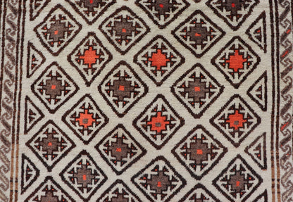 Antique Hand - Knotted Baluch Tribal Rug with All - Over Geometric Diamond Design. Keivan Woven Arts, rug EMB - 9679 - P13559; country of origin / type: Iran / Baluch, circa 1930s. This Antique Baluch Rug has been hand - knotted and features an impressive... - Keivan Woven ArtsEMB - 9679 - P13559 - 16241Rug