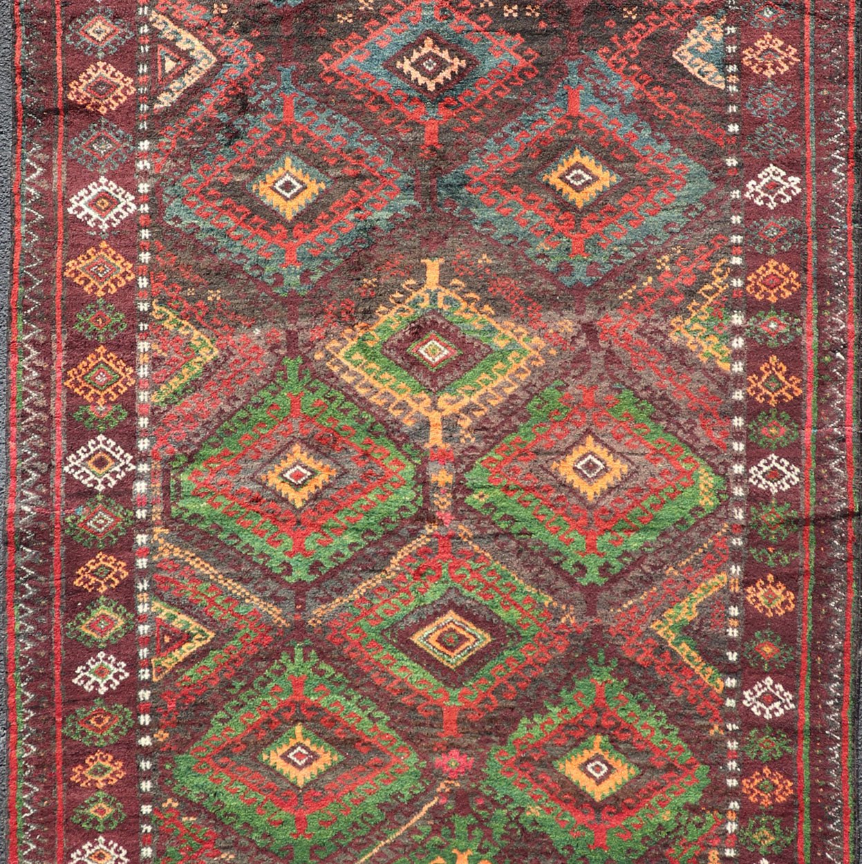 Antique Baluch Tribal Rug with All - Over Geometric in Colorful Design and Motifs Antique Baluch Tribal Rug with All - Over Geometric in Colorful Design and Motifs. Keivan Woven Arts, rug EMB - 9680 - P13558; country of origin / type: Iran / Baluch, ci... - Keivan Woven ArtsEMB - 9680 - P13558 - 16247Rug