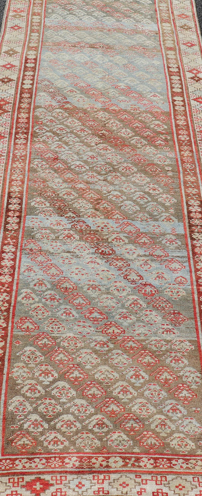 Antique Kurdish Runner in Soft Tones in Wool with Sub - Geometric Paisley Design. Keivan Woven Arts / rug EMB - 9682 - P13585, country of origin / type: Iran / kurdish, circa 1900. This antique Persian Kurdish runner has been hand - knotted in wool and ... - Keivan Woven ArtsEMB - 9682 - P13585 - 16265Rug