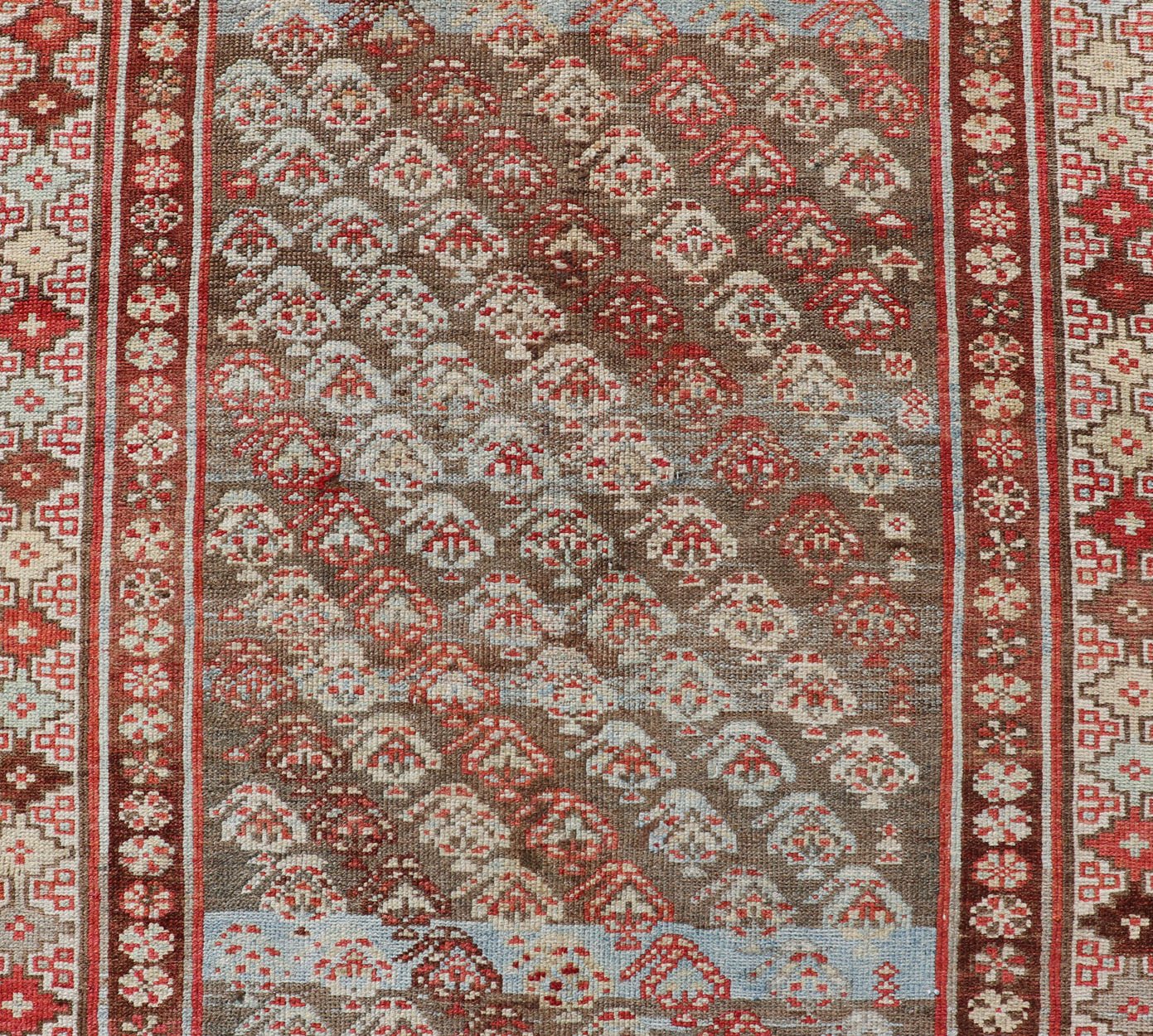 Antique Kurdish Runner in Soft Tones in Wool with Sub - Geometric Paisley Design. Keivan Woven Arts / rug EMB - 9682 - P13585, country of origin / type: Iran / kurdish, circa 1900. This antique Persian Kurdish runner has been hand - knotted in wool and ... - Keivan Woven ArtsEMB - 9682 - P13585 - 16265Rug