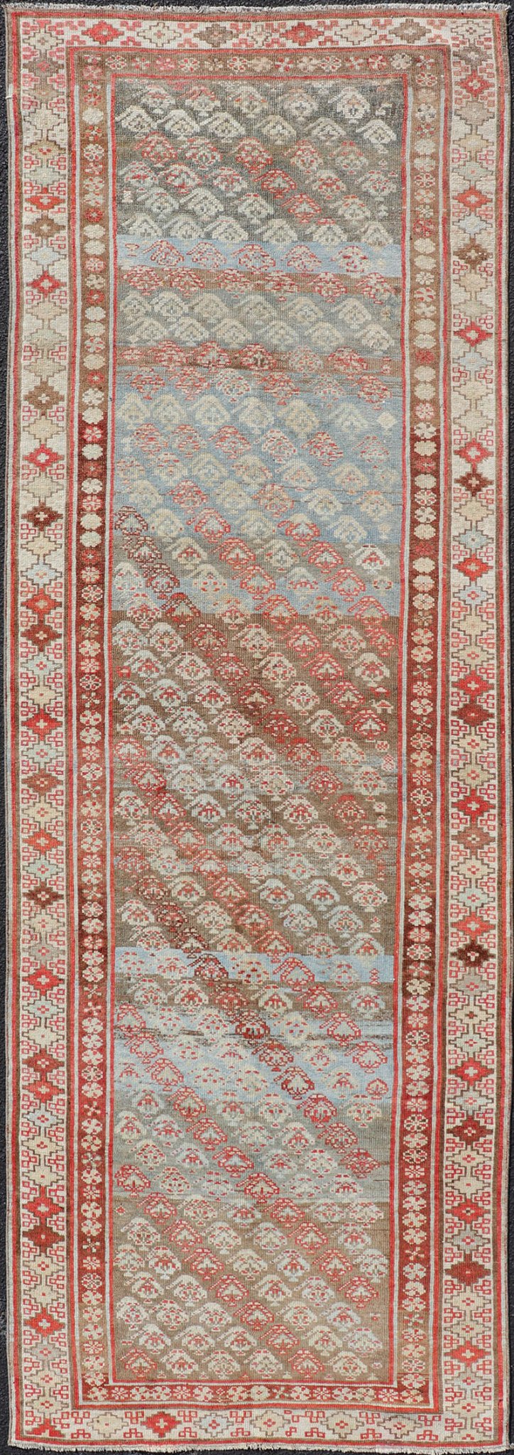 Antique Kurdish Runner in Soft Tones in Wool with Sub - Geometric Paisley Design. Keivan Woven Arts / rug EMB - 9682 - P13585, country of origin / type: Iran / kurdish, circa 1900. This antique Persian Kurdish runner has been hand - knotted in wool and ... - Keivan Woven ArtsEMB - 9682 - P13585 - 16265Rug