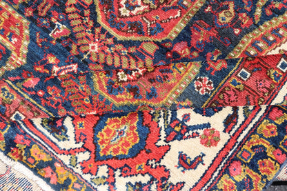 Antique Persian Paisley Field Hamadan in Multi - Tiered Border in Red and Blue This unique Persian Hamadan features a dark blue background placed behind a sub - geometric, red and mustard paisley design. The boldened border highlights ivory between... - Keivan Woven ArtsEMB - 9683 - P13868 - 16271Rug