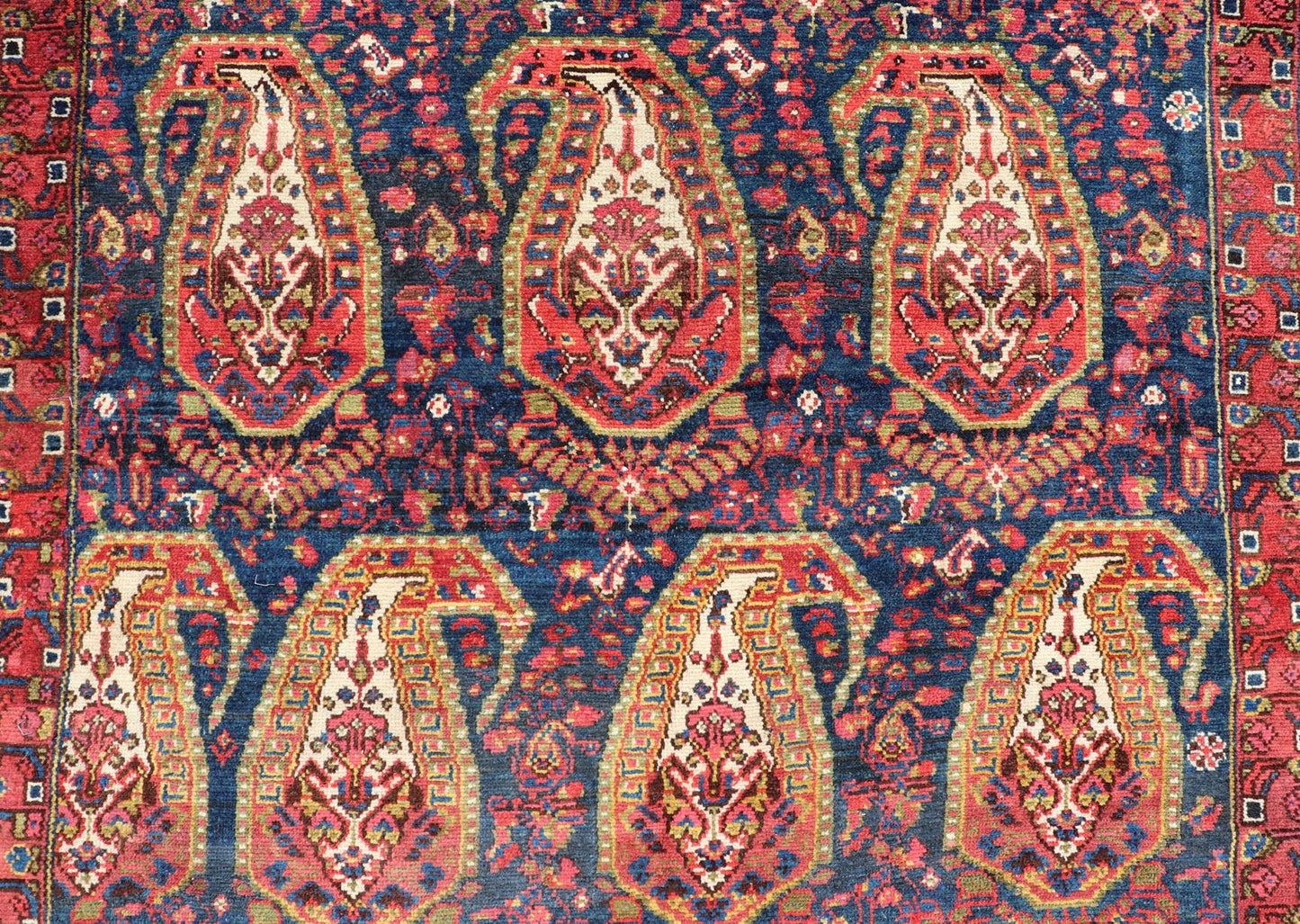 Antique Persian Paisley Field Hamadan in Multi - Tiered Border in Red and Blue This unique Persian Hamadan features a dark blue background placed behind a sub - geometric, red and mustard paisley design. The boldened border highlights ivory between... - Keivan Woven ArtsEMB - 9683 - P13868 - 16271Rug