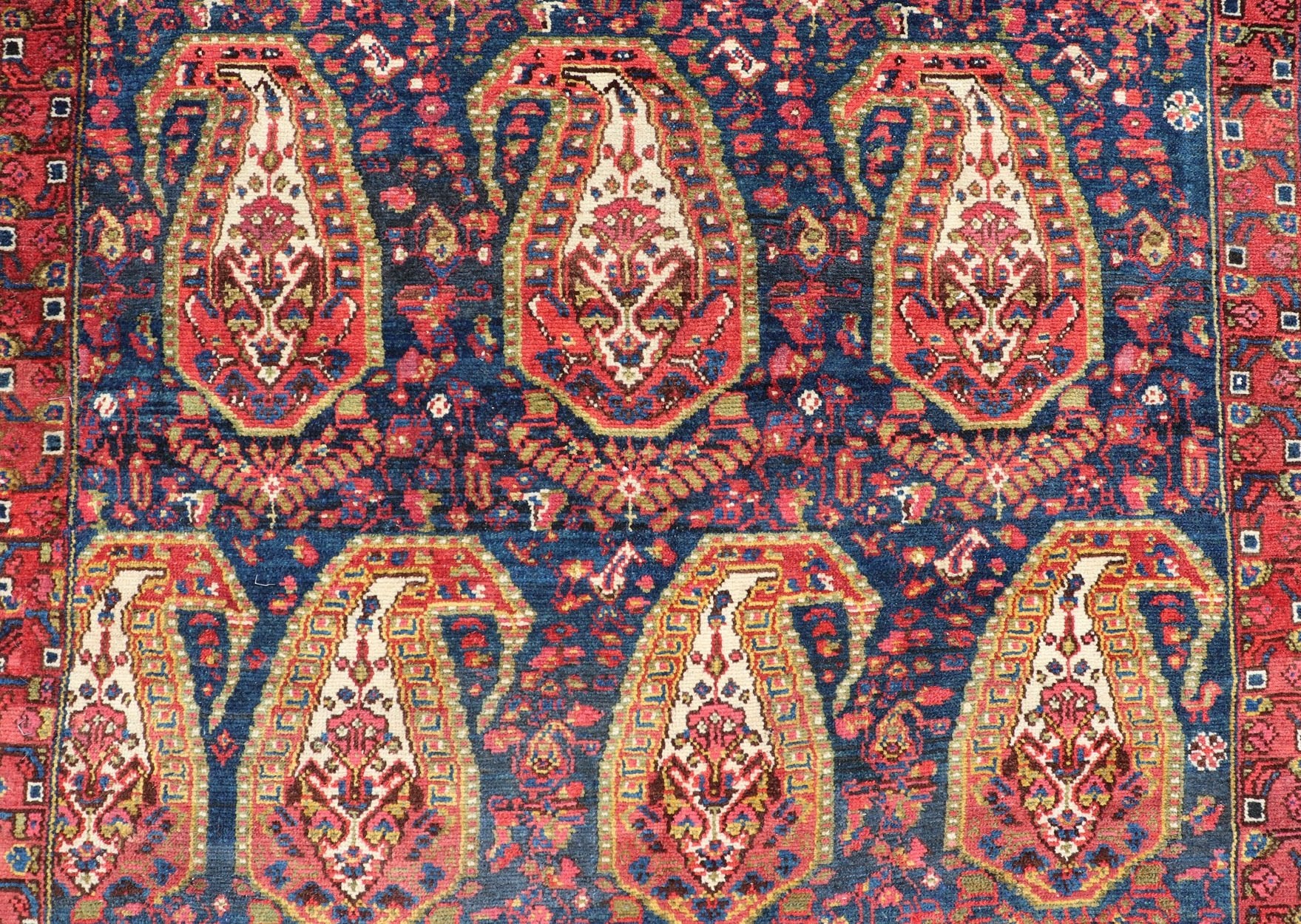 Antique Persian Paisley Field Hamadan in Multi - Tiered Border in Red and Blue This unique Persian Hamadan features a dark blue background placed behind a sub - geometric, red and mustard paisley design. The boldened border highlights ivory between... - Keivan Woven ArtsEMB - 9683 - P13868 - 16271Rug