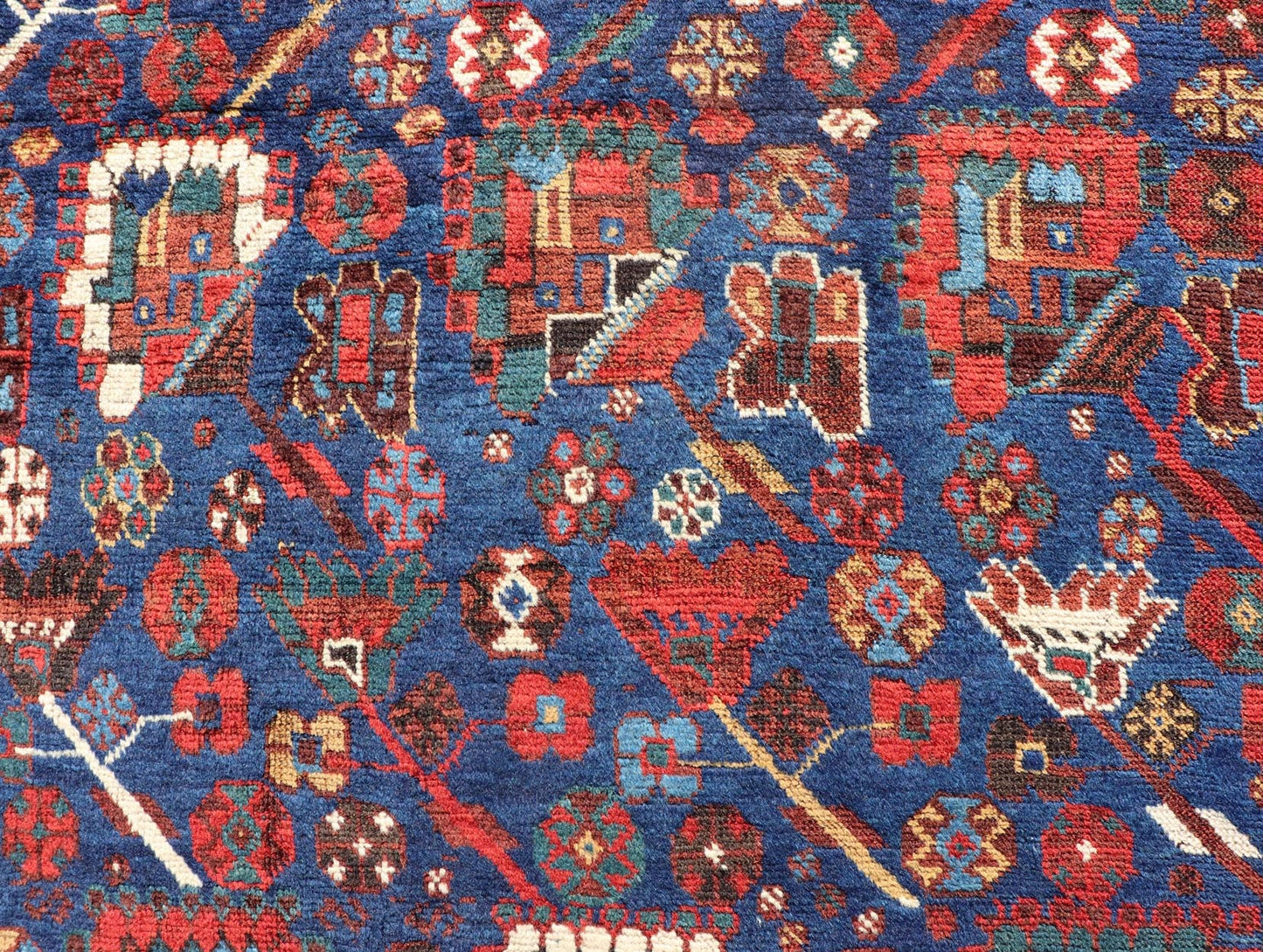 Antique Persian Qashqai Shiraz Tribal Rug with All - Over Tribal Design Antique Persian Qashqai Shiraz Tribal Rug with Tribal Design in jewel tones with blue background. Keivan Woven Arts / rug EMB - 9687 - P13529, country of origin / type: Iran / Qas... - Keivan Woven ArtsEMB - 9687 - P13529 - 16289Rug