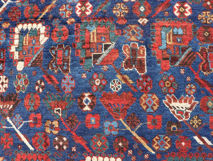 Antique Persian Qashqai Shiraz Tribal Rug with All - Over Tribal Design Antique Persian Qashqai Shiraz Tribal Rug with Tribal Design in jewel tones with blue background. Keivan Woven Arts / rug EMB - 9687 - P13529, country of origin / type: Iran / Qas... - Keivan Woven ArtsEMB - 9687 - P13529 - 16289Rug