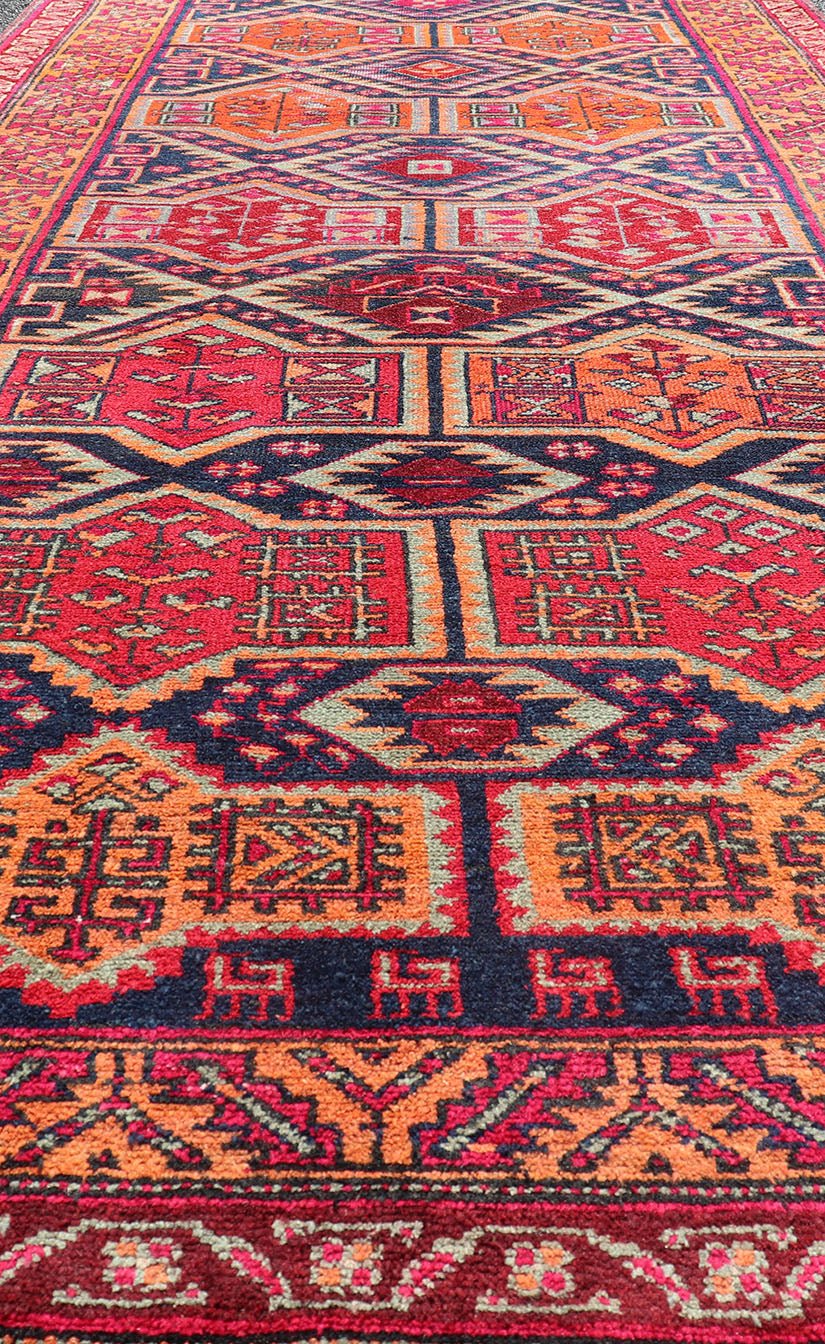 Antique Hand - Knotted Karajeh Gallery Rug in Wool with All - Over Geometric Design This antique Persian Karajeh gallery rug features an all - over sub - geometric design rendered in multicolor tones, set upon a navy blue background. A complementary, m... - Keivan Woven ArtsEMB - 9689 - P13526 - 16301Rug