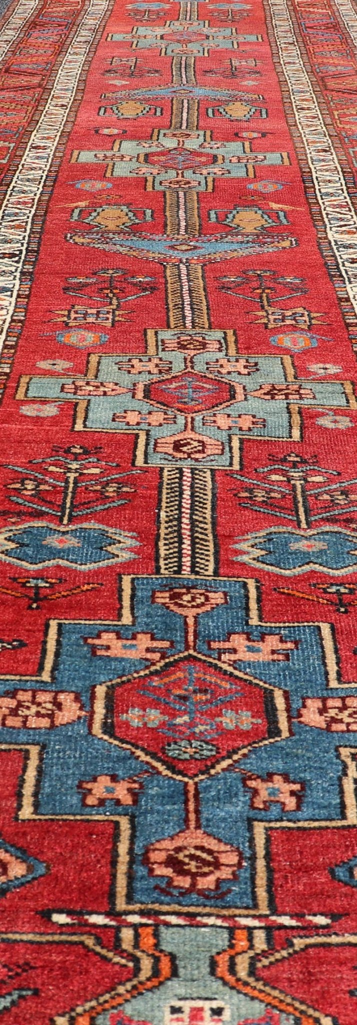 Antique Persian Long Persian Serapi Runner in Wool with Medallion Design This antique Persian Serapi rug was hand - knotted in wool and features a sub - geometric medallion design rendered in multicolor. A complementary, multi - tiered border encompas... - Keivan Woven ArtsEMB - 9691 - P13533 - 16313Rug