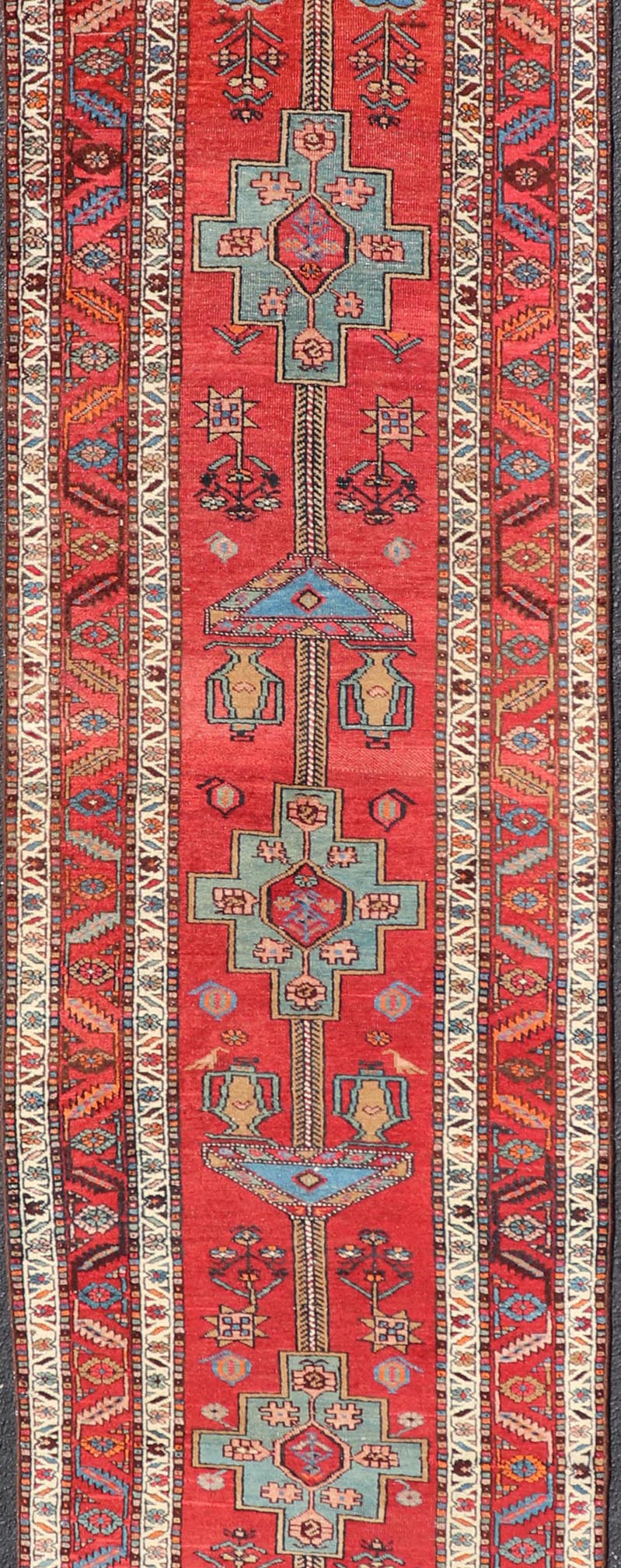 Antique Persian Long Persian Serapi Runner in Wool with Medallion Design This antique Persian Serapi rug was hand - knotted in wool and features a sub - geometric medallion design rendered in multicolor. A complementary, multi - tiered border encompas... - Keivan Woven ArtsEMB - 9691 - P13533 - 16313Rug