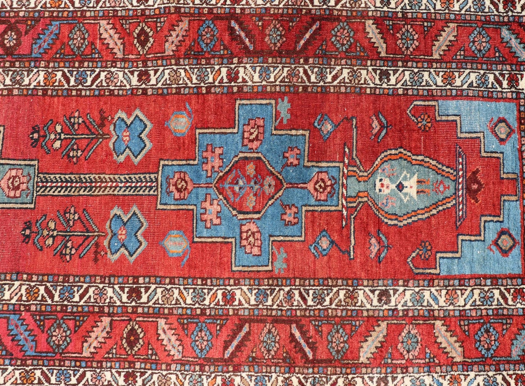 Antique Persian Long Persian Serapi Runner in Wool with Medallion Design This antique Persian Serapi rug was hand - knotted in wool and features a sub - geometric medallion design rendered in multicolor. A complementary, multi - tiered border encompas... - Keivan Woven ArtsEMB - 9691 - P13533 - 16313Rug