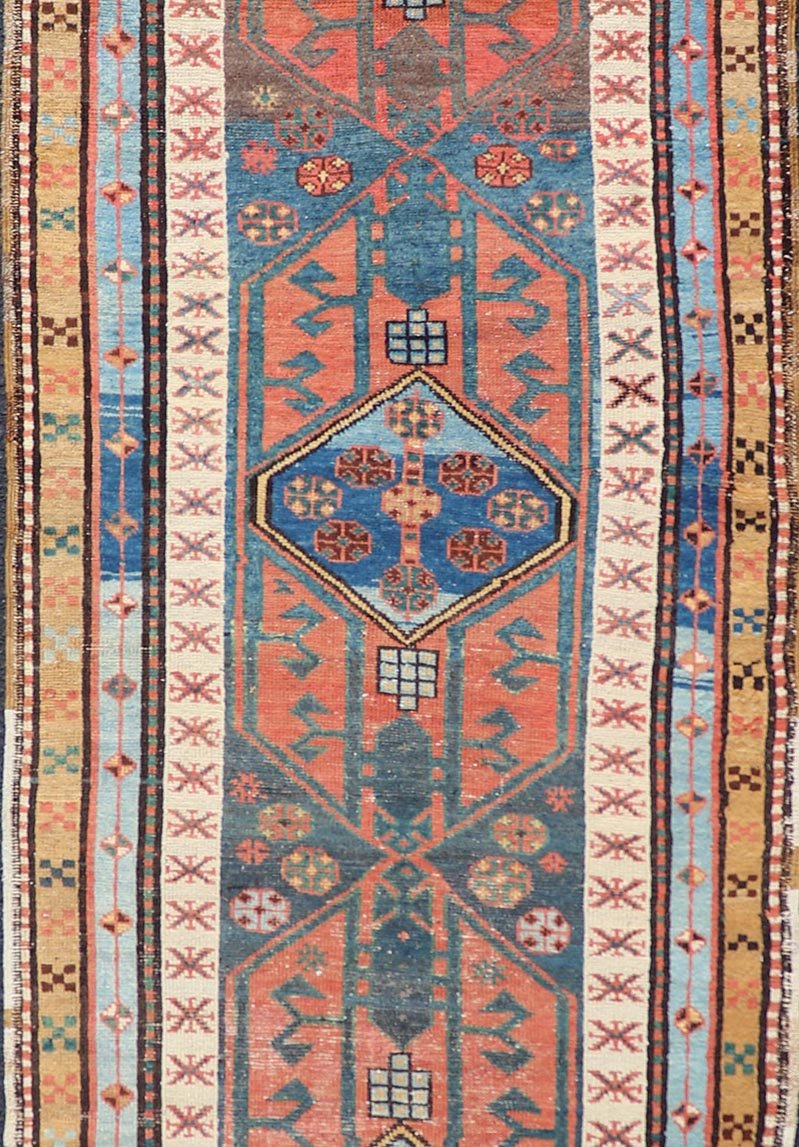 Antique Colorful Persian Heriz - Serapi Runner with a Bold Geometric Design Antique Colorful Persian Heriz - Serapi Runner with a Bold Geometric Design, Keivan Woven Arts / Rug/EMB - 9693 - P13532 Made in the early 20th century, this charming Heriz - ... - Keivan Woven ArtsEMB - 9693 - P13532 - 16319Rug