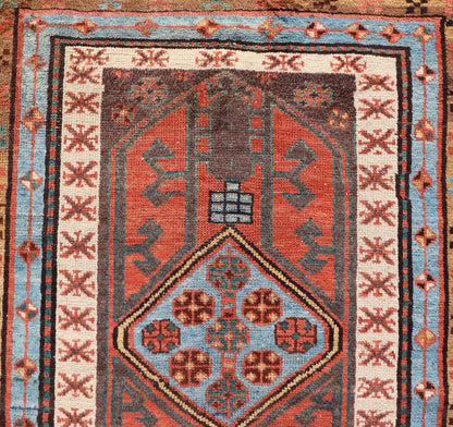 Antique Colorful Persian Heriz - Serapi Runner with a Bold Geometric Design Antique Colorful Persian Heriz - Serapi Runner with a Bold Geometric Design, Keivan Woven Arts / Rug/EMB - 9693 - P13532 Made in the early 20th century, this charming Heriz - ... - Keivan Woven ArtsEMB - 9693 - P13532 - 16319Rug
