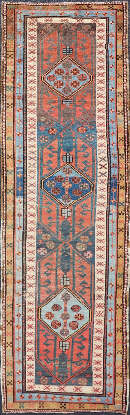 Antique Colorful Persian Heriz - Serapi Runner with a Bold Geometric Design Antique Colorful Persian Heriz - Serapi Runner with a Bold Geometric Design, Keivan Woven Arts / Rug/EMB - 9693 - P13532 Made in the early 20th century, this charming Heriz - ... - Keivan Woven ArtsEMB - 9693 - P13532 - 16319Rug
