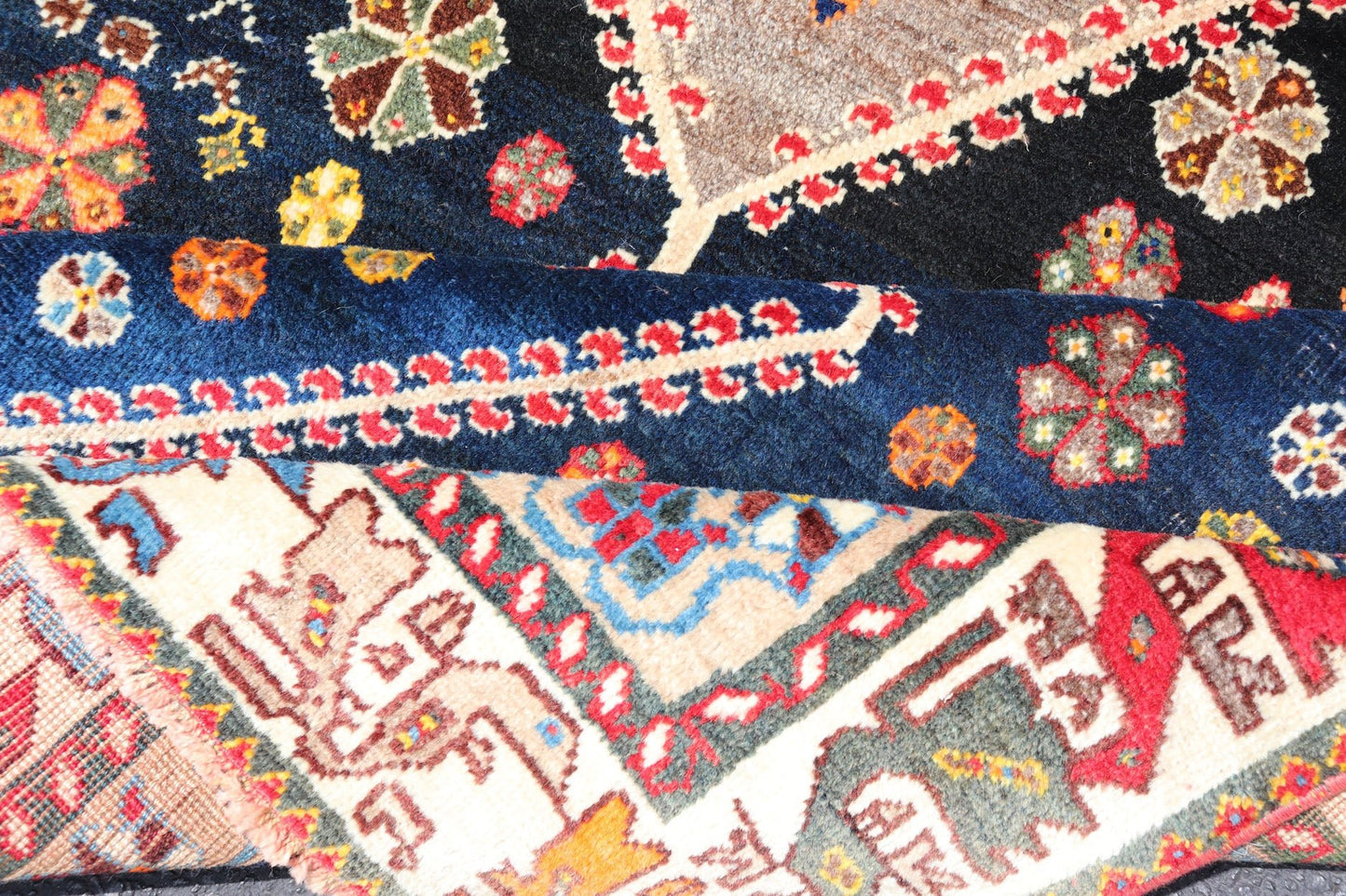 Vintage Persian Tribal Shiraz with Medallion Design on Dark Background This vintage Persian Shiraz features a rich navy blue background under the centered red medallions, edged with green, gold, taupe, maroon, pinks and reds. Paired with ea... - Keivan Woven ArtsEMB - 9694 - P13894 - 16510Rug