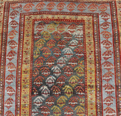 Antique Persian Hand - Knotted Kurdish Runner in Wool with Sub - Geometric Design This antique Persian Kurdish runner has been hand - knotted in wool and features an all - over sub - geometric design rendered in multicolor. A complementary, multi - tiered... - Keivan Woven ArtsEMB - 9698 - P13888 - 16540Rug