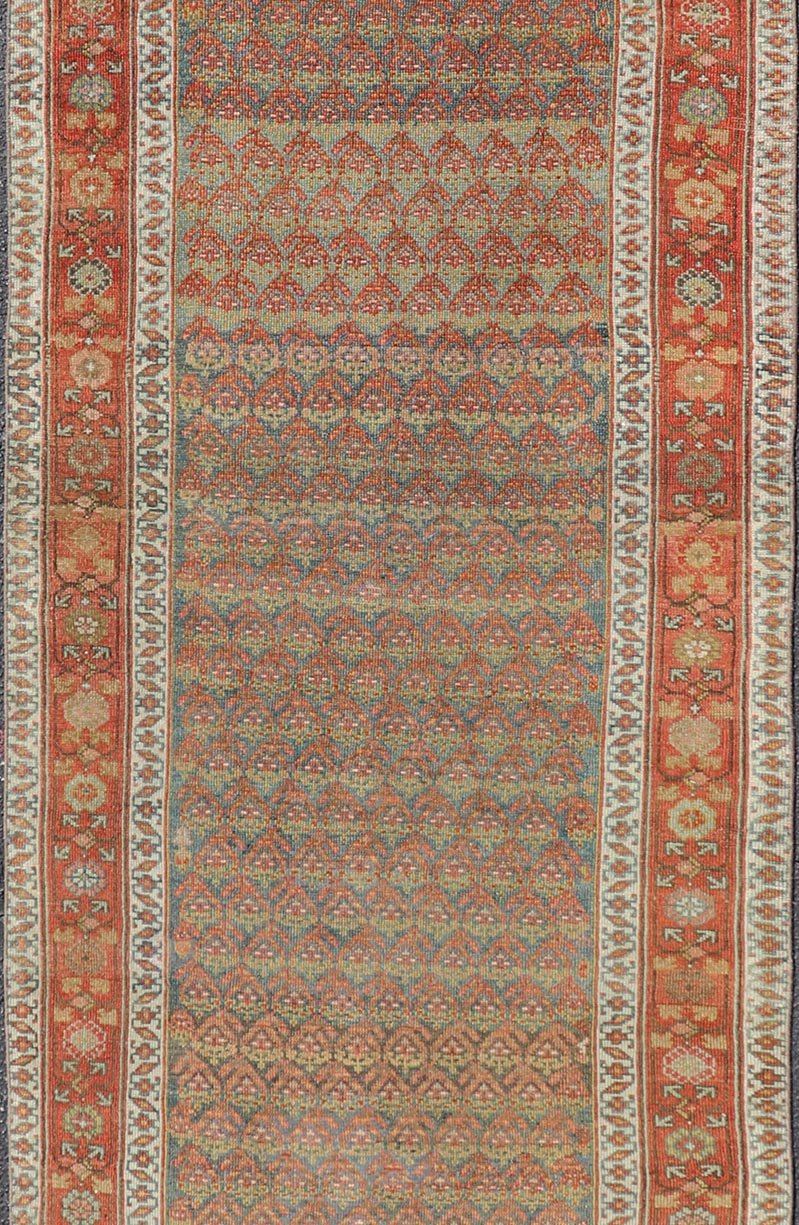 Antique Persian Hamadan Gallery Runner in Wool with All - Over Tribal Design Measures: 3'6 x 12'8 This antique Persian Hamadan rug has been hand - knotted in wool and features an all - over sub - geometric design rendered in red's, pink, green, ... - Keivan Woven ArtsEMB - 9700 - P13882 - 16552Rug